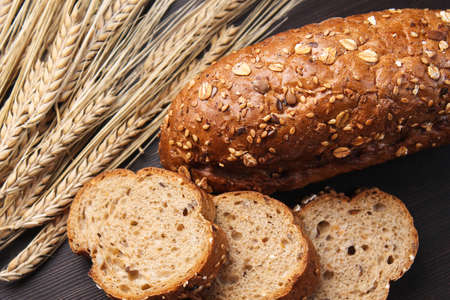 Fresh baked bread with ears on the table