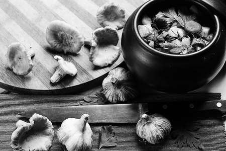 potatoes with mushrooms in a clay pot. Mushrooms from the forestの写真素材