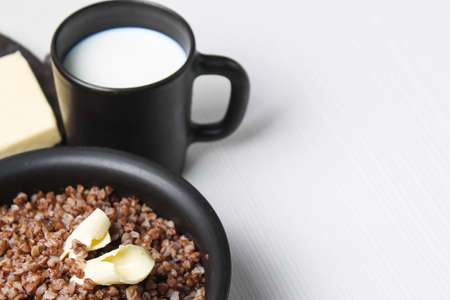 buckwheat porridge on the table. Boiled buckwheat. Breakfast isの写真素材