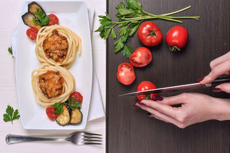 Italian pasta with meat in a cafe. Dinner in the restaurant. Hanの写真素材