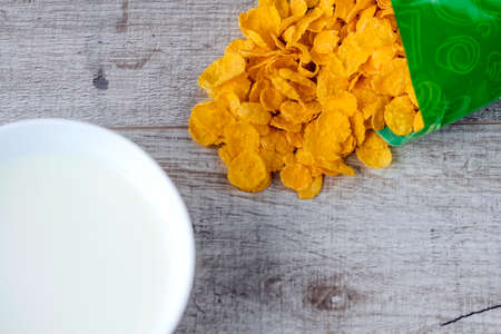 Cereal and fruit for Breakfast on the table. Delicious food at hの写真素材