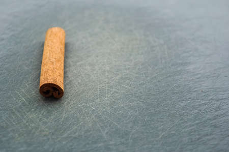 Cinnamon sticks lying on the table in the kitchen. の写真素材