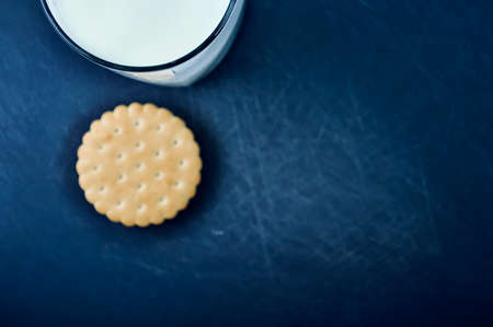 Cookies and milk on the kitchen table. Breakfast in the kitchenの写真素材