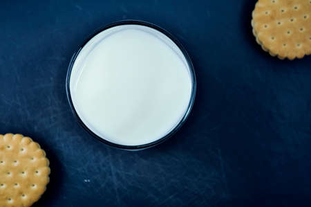 Cookies and milk on the kitchen table. Breakfast in the kitchenの写真素材