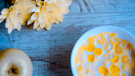 Cereal and fruit for Breakfast on the table. Delicious food at hの写真素材