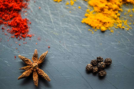 Eastern condiments scattered on a table at home. の写真素材