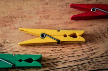 Clips for drying clothes indoors and outdoors. Holders wet clothの写真素材