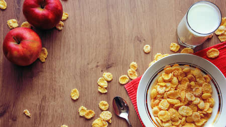 Cereal and fruit for Breakfast on the table.