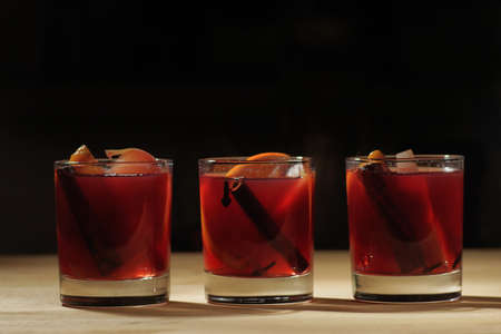 Hot wine drink. Warm Christmas wine. Mulled wine with oranges anの写真素材
