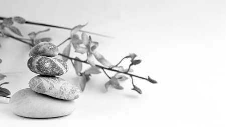 Balance of stones. Stones for spa treatments on a white backgrou