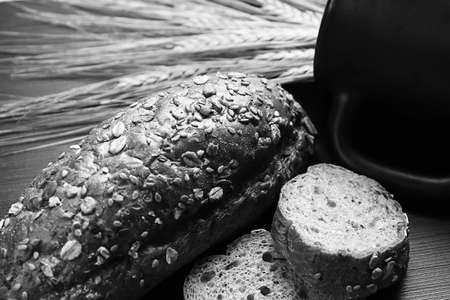 Fresh baked bread with ears of wheat. Wheat yellow. Breakfast isの写真素材