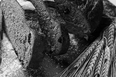 Fresh baked bread with ears of wheat. Wheat yellow. Breakfast isの写真素材