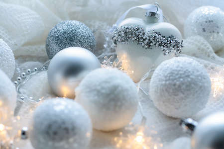 Christmas toys and balls to knit the scarf. Decorations on holidの写真素材