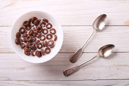 Cereal for Breakfast is on the table. Delicious rings from milk.の写真素材