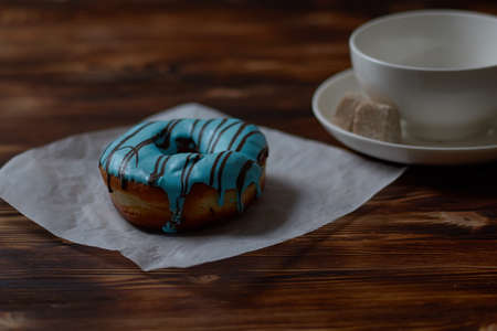 Sweet donuts on a dessert on a wooden backgroundの写真素材