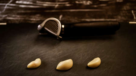 A composition of cloves of garlic on the table.の写真素材
