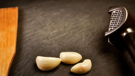 A composition of cloves of garlic on the table.の写真素材