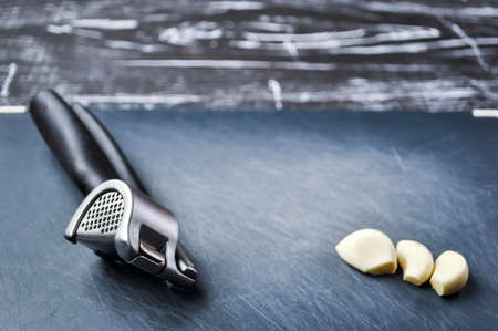 A composition of cloves of garlic on the table. の写真素材