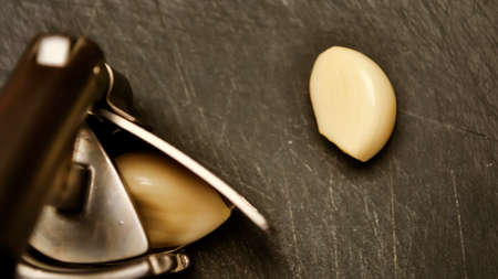 A composition of cloves of garlic on the table.の写真素材