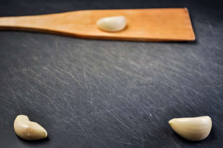 A composition of cloves of garlic on the table. Healthy eating.の写真素材