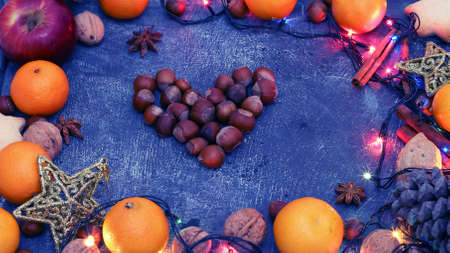 Background of Christmas decorations and gifts with multi-colored garlands. の写真素材