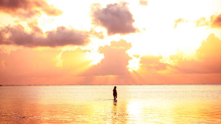 Sunset on the beach in the evening. Sunrise at sea beautiful. Laの写真素材