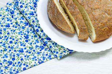 sliced fresh bread on the table in the morning. Carbohydraの写真素材