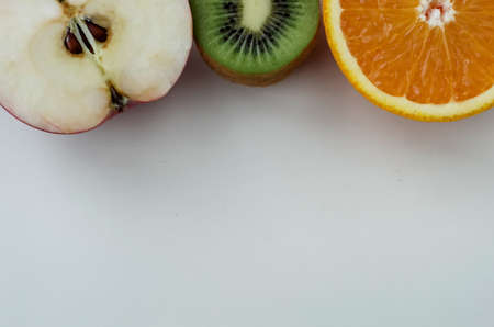 Background of fresh sliced fruit on a table in the afternoの写真素材