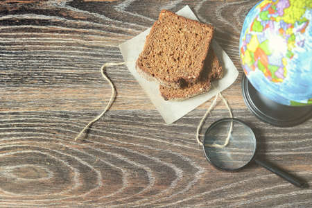 Education books and other objects on the tableの写真素材