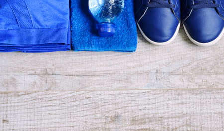 Fitness accessories. Sports dumbbells sneakers sports shoes andの写真素材