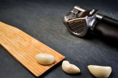 A composition of cloves of garlic on the table. Healthy eating.の写真素材