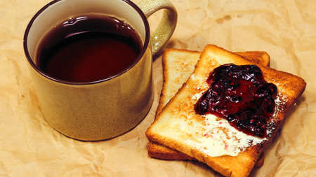 Fresh toast with tea on the table in the morning. Tasty food. Toの写真素材