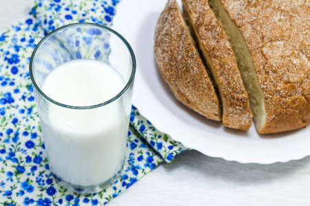 sliced fresh bread on the table in the morning. Carbohydraの写真素材