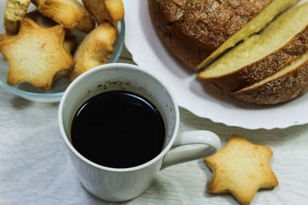 Breakfast of fresh toast, cookies and waffle with jam on the tabの写真素材