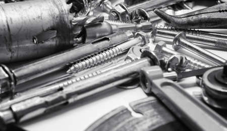 Working metal tools of silver color on the background