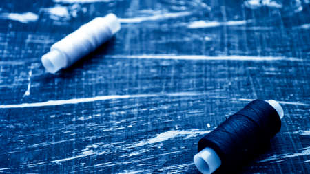 The spool of thread on the table. Thread on a reel for craft. Maの写真素材