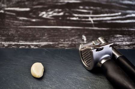 A composition of cloves of garlic on the table. Healthy eating.