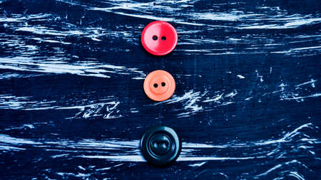 Buttons for clothing and sewing on the table. Decorative items oの写真素材