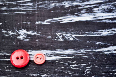 Buttons for clothing and sewing on the table. Decorative items oの写真素材