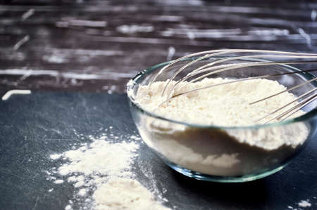 Flour and whisk for cooking food and cooking for women. Womensの写真素材