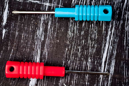 Screwdrivers to repair lying on the table. Mens housework. Fixの写真素材