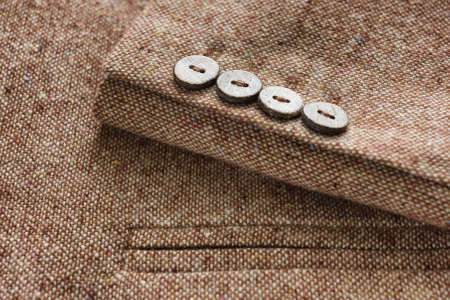 Tweed jacket with its details of buttons