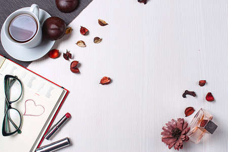 stationery lying on the table the woman