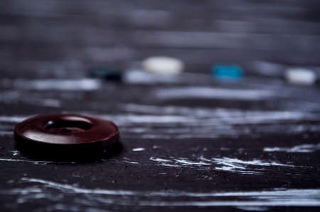 Buttons for clothing and sewing on the table.の写真素材