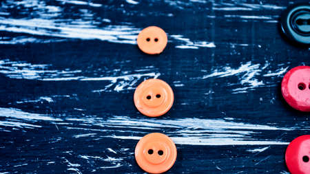 Buttons for clothing and sewing on the table. Decorative items oの写真素材