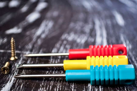 Screwdrivers to repair lying on the table. Mens housework.の写真素材