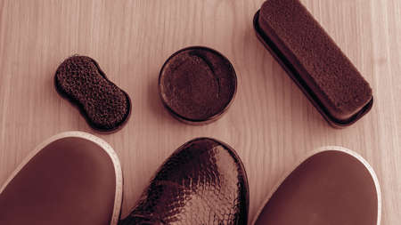 Shoes and scouring cream on the floor. Clean shoes for walking.