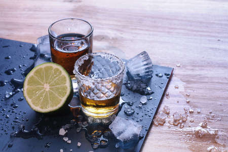 Alcoholic strong drinks in glass on the backgroundの写真素材