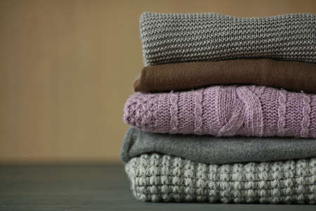 Autumn accessories knitted sweaters and leaves