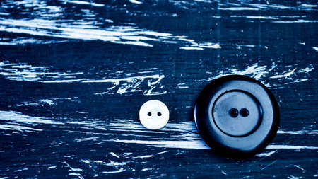 Buttons for clothing and sewing on the table. Decorative itemsの写真素材